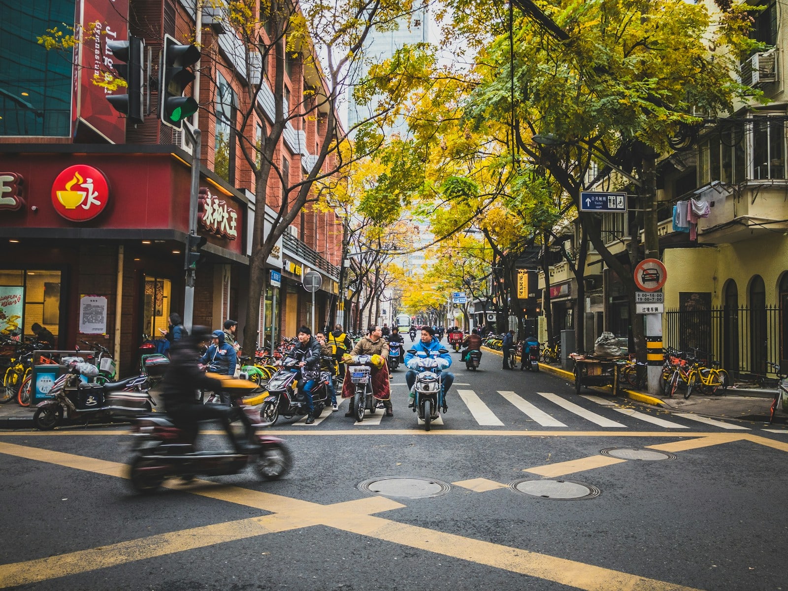 People moving through an everyday Shanghai street